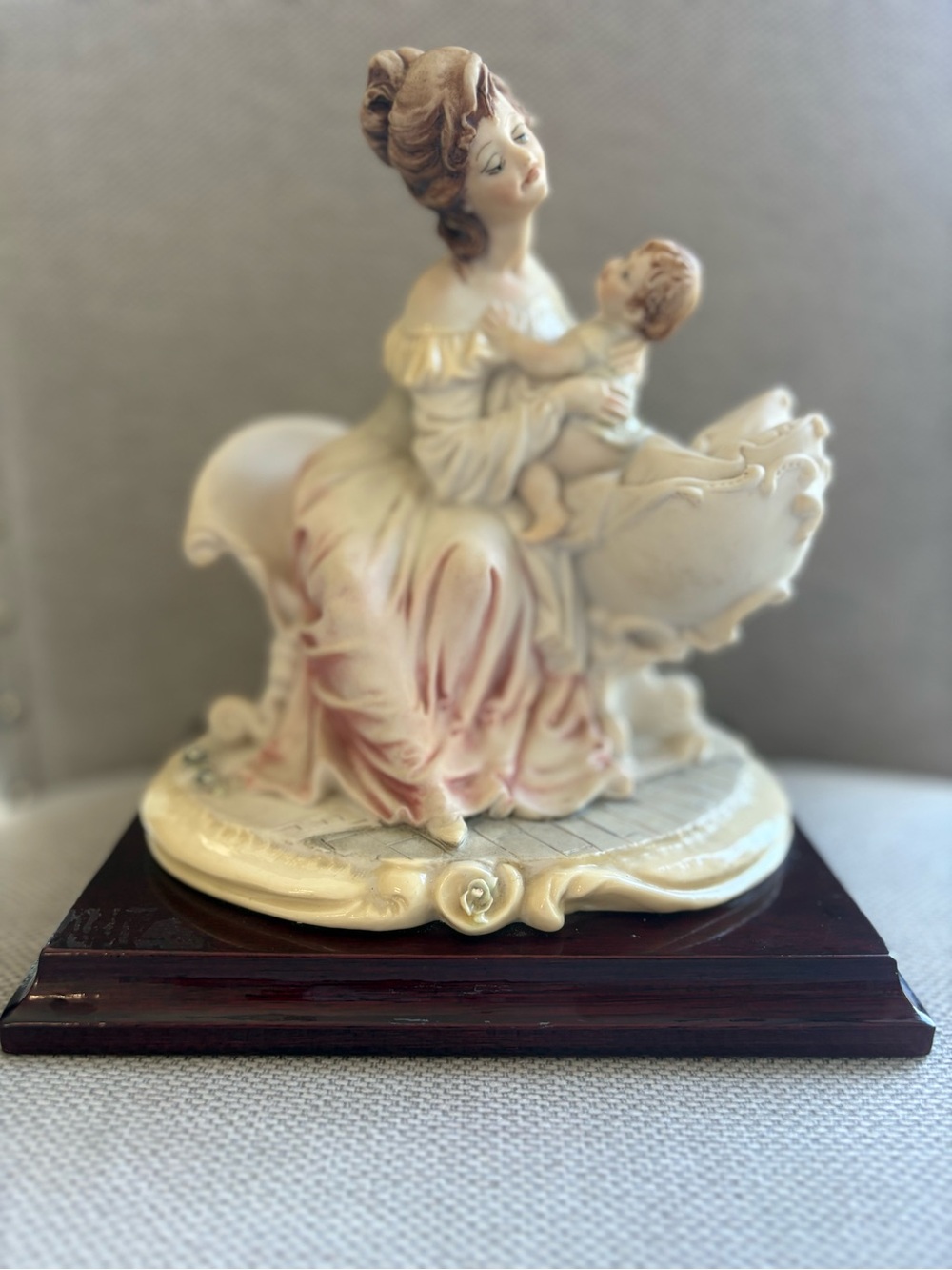 Porcelain Mother and Child Sculpture in Cream and Pink Accent